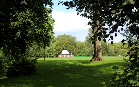 View of observatory through trees on Moor Park.