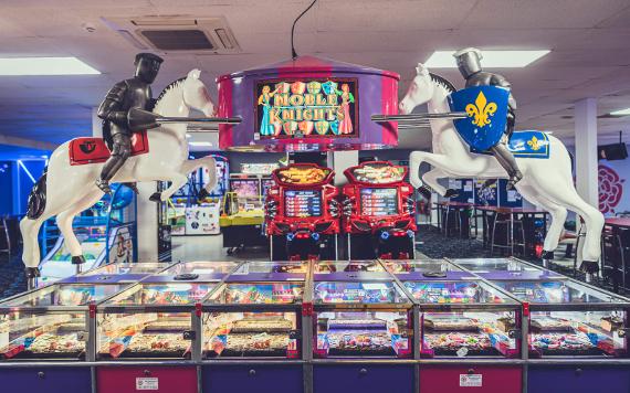 Vintage penny machines in Red Rose Bowl's arcade.