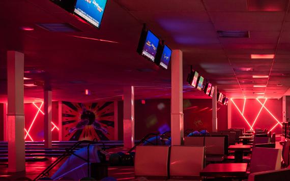 Red Rose Bowl bowling lanes lit up in red.