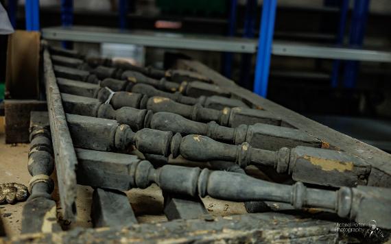 Old and worn wooden railings stored in Harris storage room.