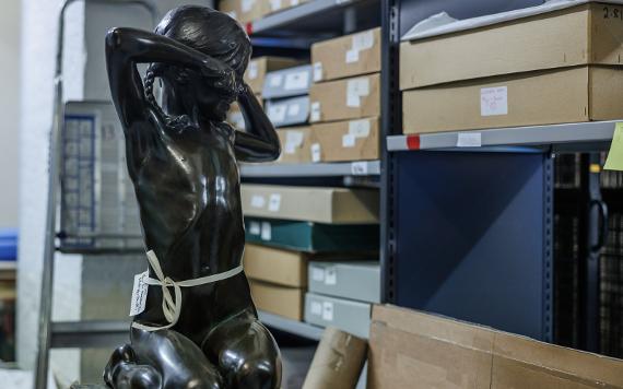 Young girl statue, tagged inside Harris storage room.