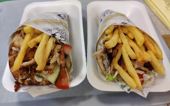 Two Pita Gyros from Greekouzina restaurant packed with food