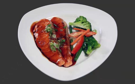 A beautifully presented Salmon Teriyaki dish from Meiz Restaurant