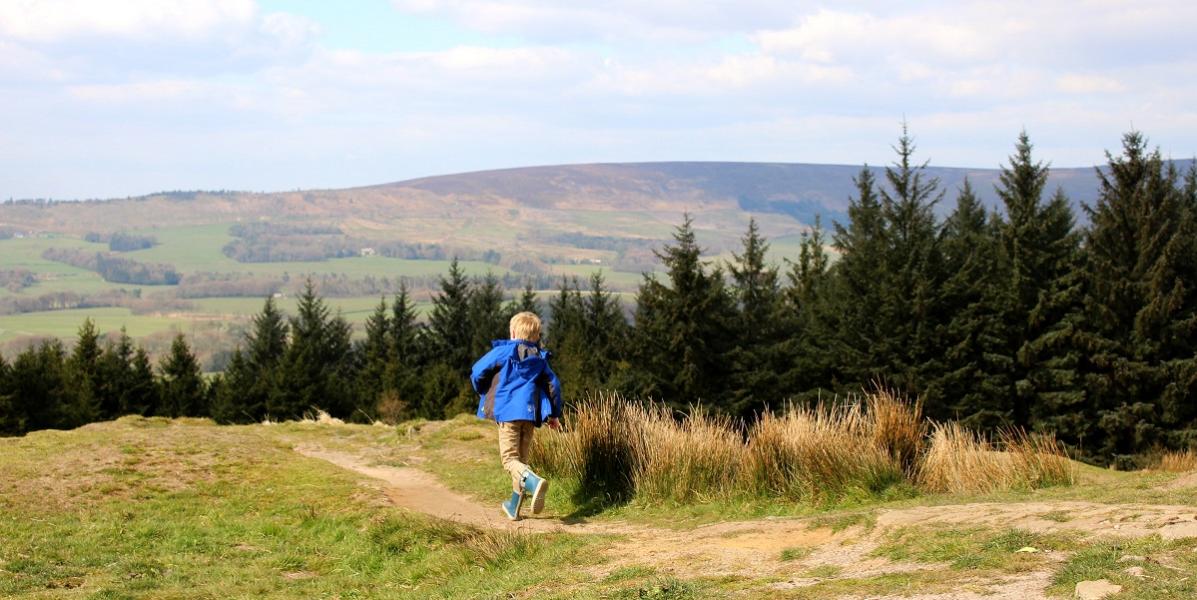 Child enjoying the outdoors at Beacon Fell 