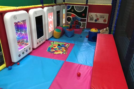 Rascals Party and Play Centre Baby area with padded floor mats and interactive wall screens