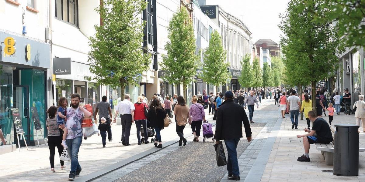 People walking down Fishergate High Street People walking down Fishergate High Street