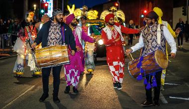 Band performing in torchlight procession