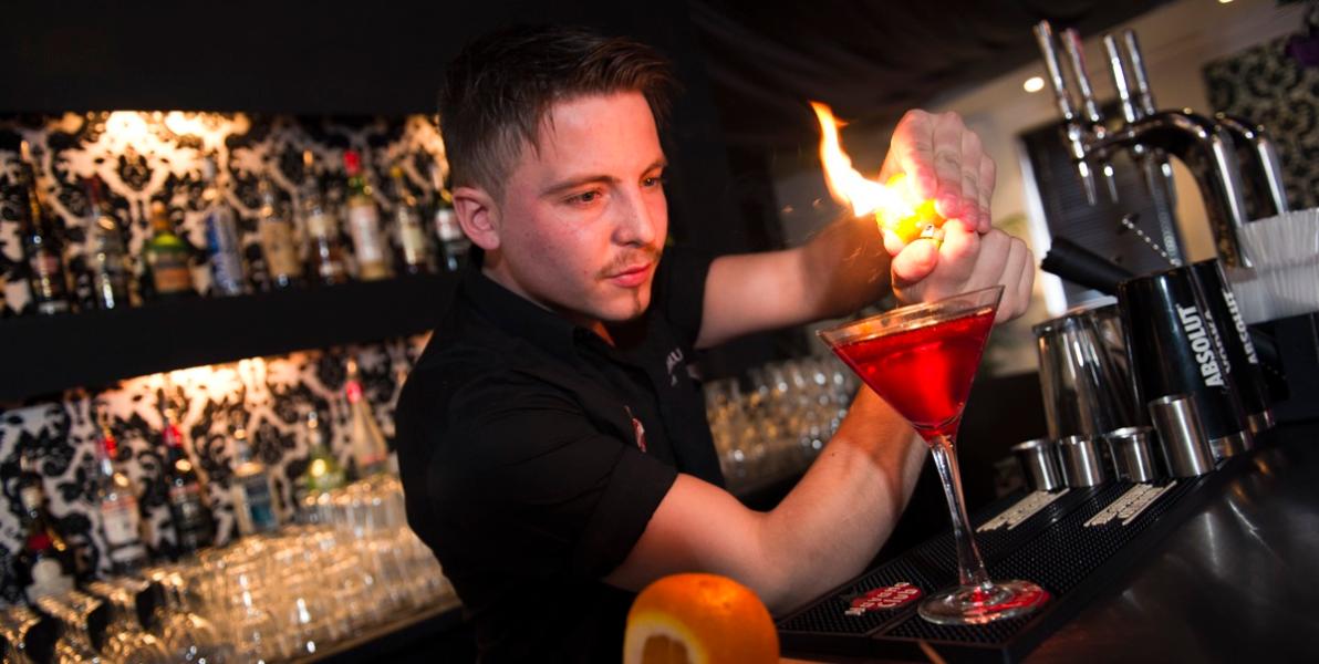 Barman making drink Barman making drink