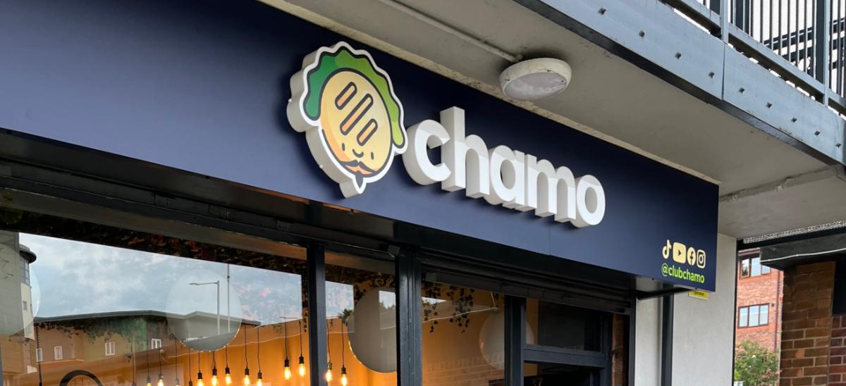 Sign frontage of Chamo Street Food in Preston