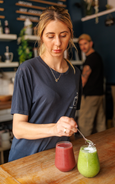 Waitress making a drink