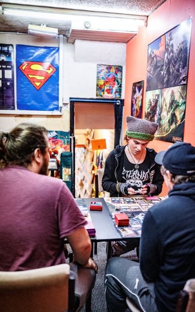 Young people playing card games