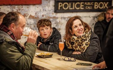 Family enjoying food and drink. Image credit: Michael Porter