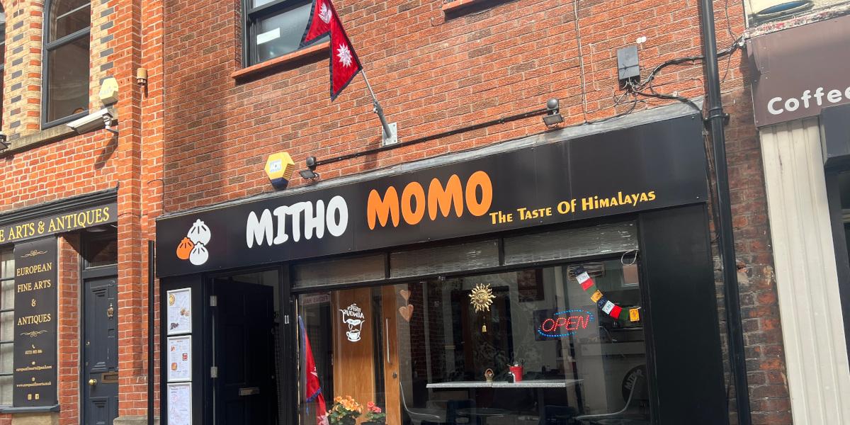 Outside Mitho Momo's front entrance