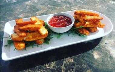 A plate of halloumi fries with a salsa dip from Moka on the Balcony