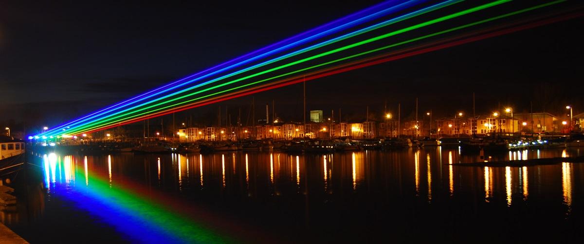 Rainbow laser light display in the sky at Preston Docks for Guild 2012 celebration