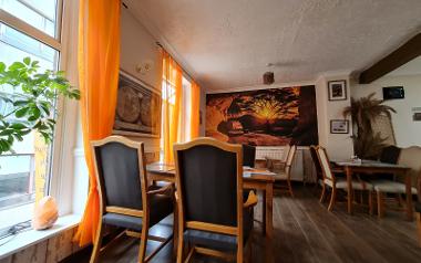 A view of the chairs and tables in the upstairs seating area inside The Tea House Preston