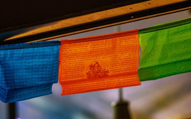 Colourful Nepalese style flags with inscriptions