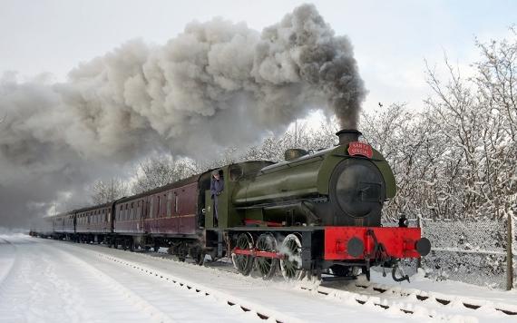 Ribble Steam Railway steam train on a snowy track.