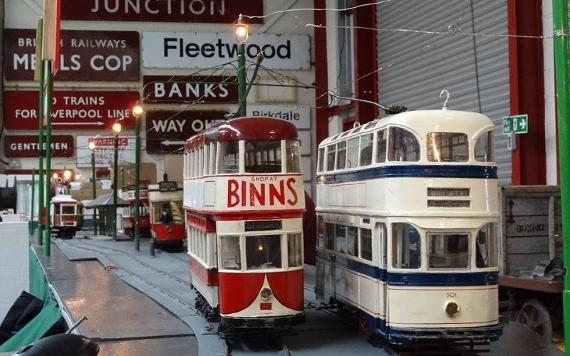 Miniature trams displayed inside Ribble Steam Railway and Museum.