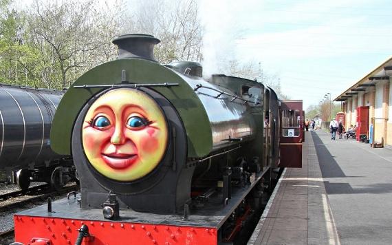 Smiling face on a steam train during Friendly Engine's event.