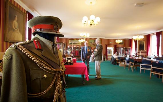 Military uniform, memorabilia and visitors inside the Lancashire Infantry Museum.