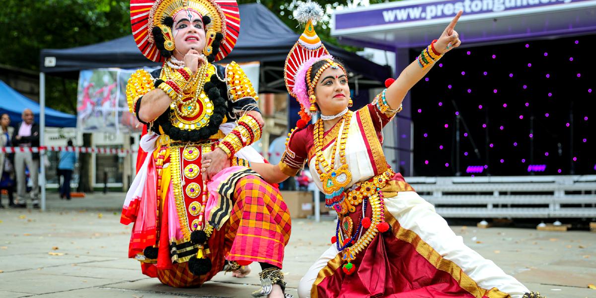 South Asian performance taking place during Mela 2021 on Preston Flag Market.