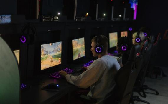 Gamers on PCs inside Belong Preston gaming arena.