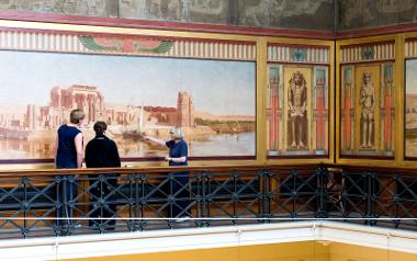 Tour taking place around the Harris' Egyptian Balcony.