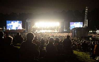 Crowd watching night time proms on park for Preston Guild 2012.