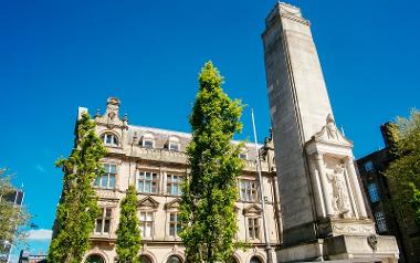 Preston Cenotaph on Flag Market, with old post office building in the background.