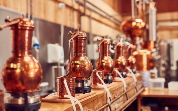 Individual gin distilling equipment in Brindle Distillery workshop area.