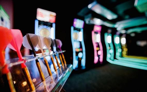 Darts and dart machines lit up in Level Preston.