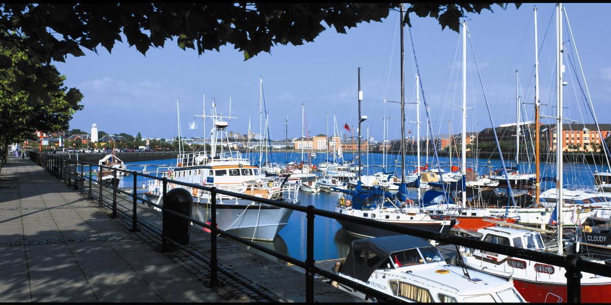 View of Preston Dock and boats on a sunny day.