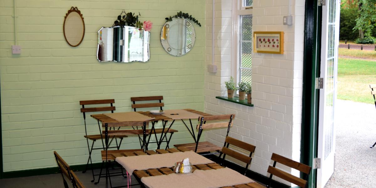 Rosemary on the Park indoor seating area with door leading to outside seating.