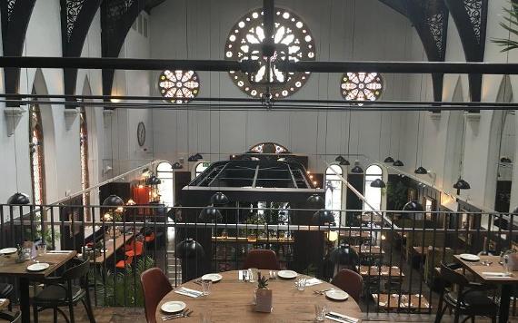 Upstairs balcony and dining area inside Preston's Bistrot Pierre.