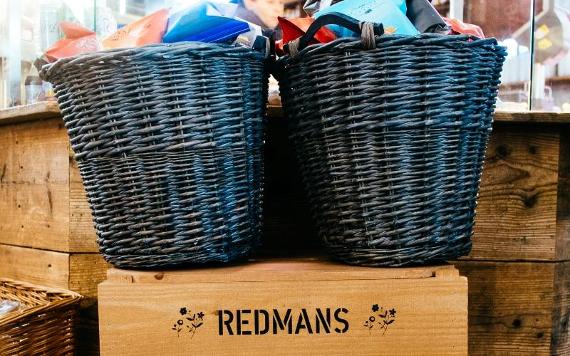 Woven baskets of crisps on sale at Redmans.