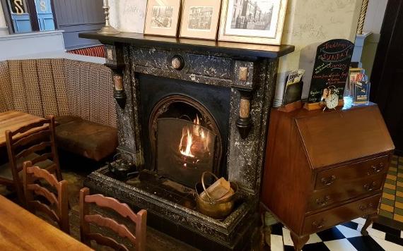 Fireplace alight in the Wellington Inn, Preston.