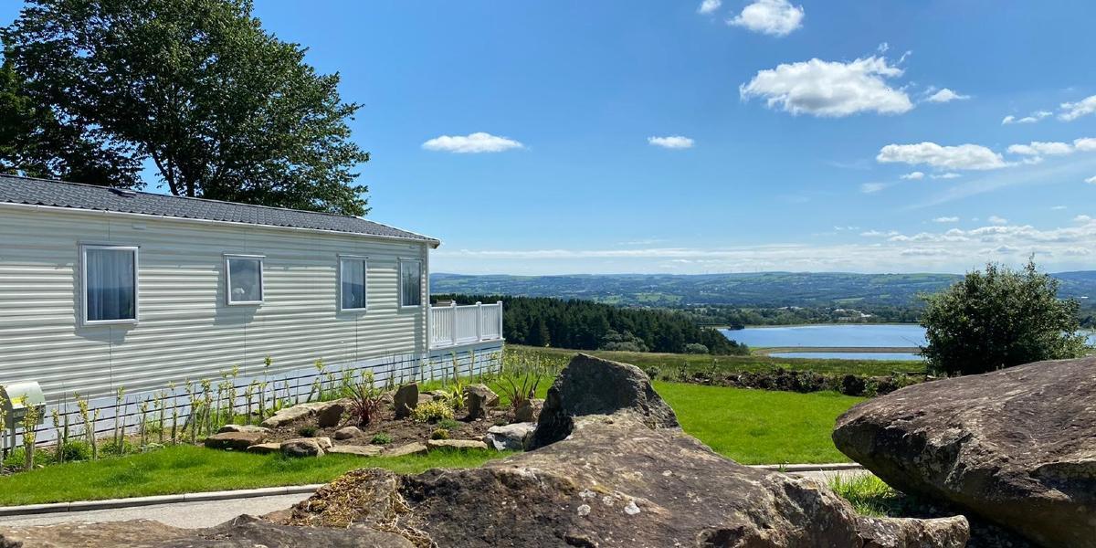 Caravan looking over countryside views from Beacon Fell View Holiday Park.