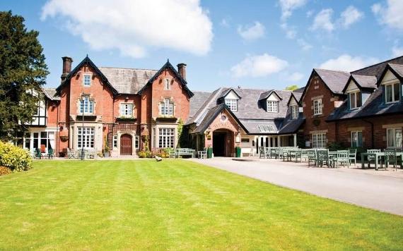 Front entrance and grounds of The Villa Wrea Green hotel.