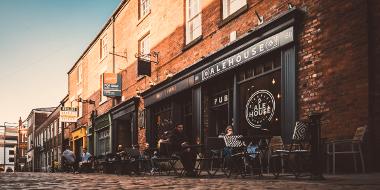 People sat outside Winckley Street Ale House.