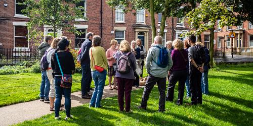 Page icon: Group tour taking place on Winckley Square. Group tour taking place on Winckley Square.