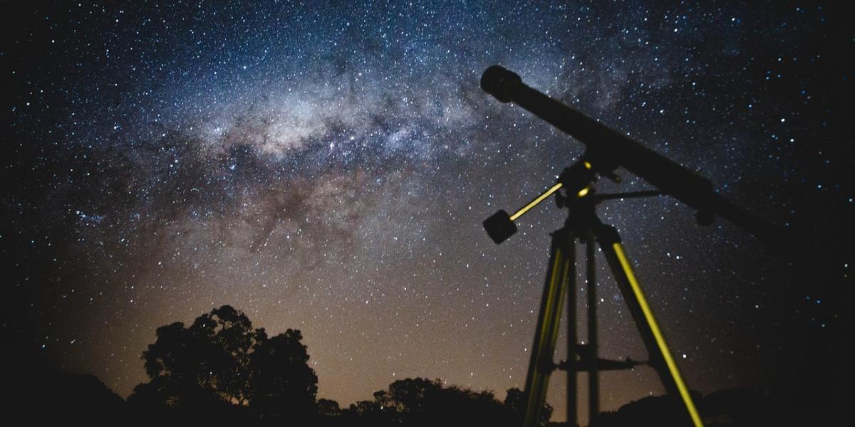 Telescope against a night sky.