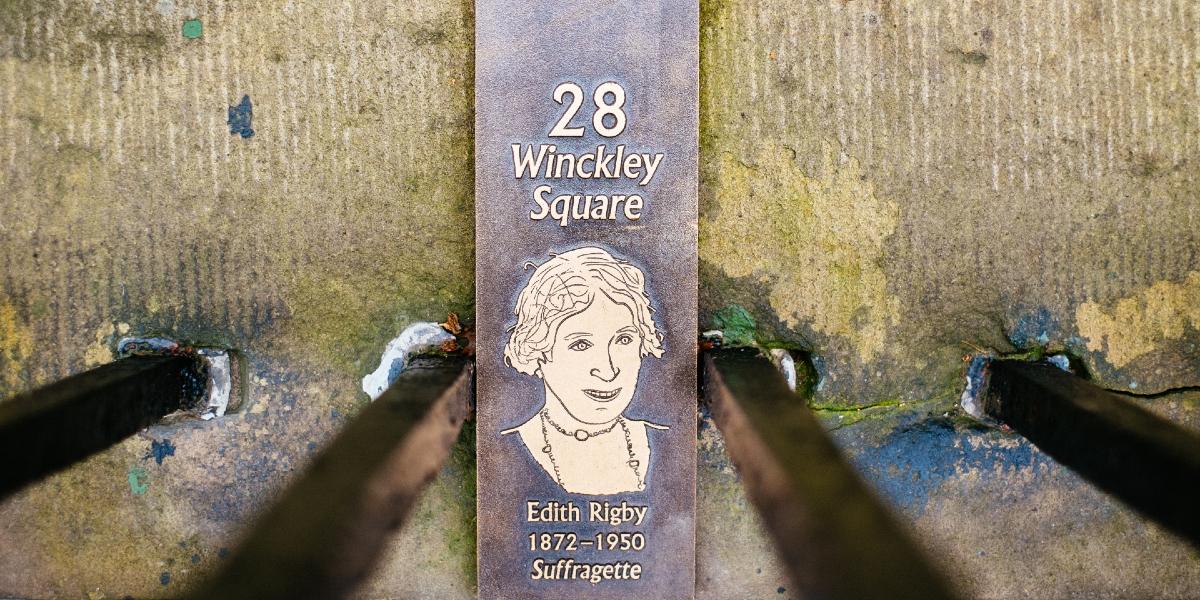 Edith Rigby plaque on wall in Winckley Square Gardens.